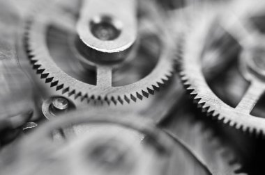 Vites siyah-beyaz. Endüstriyel geçmiş. Teknoloji, zaman, takım çalışması, sonsuzluk, iş projeleri kavramı