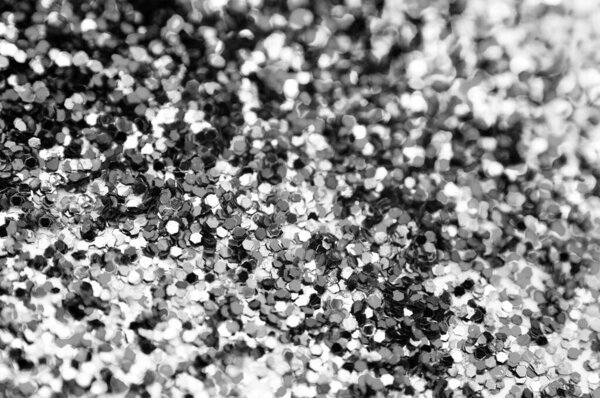  Фон из черно-белых конфет. Эффект размытия на части фотографии