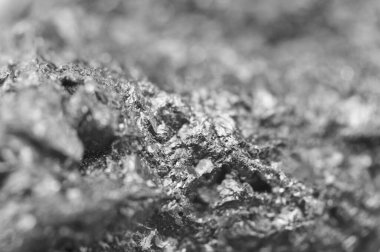 Nugget. Makro. Güzel, fantastik, soyut bir arka plan. Siyah-beyaz