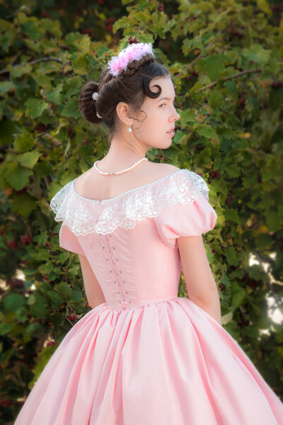 Romantic girl in evening dress.