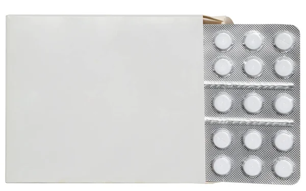 Блистерная таблетка в изолированной коробке — стоковое фото