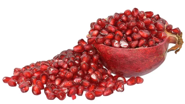Cut pomegranate with scattered grain isolated — Stock Photo, Image