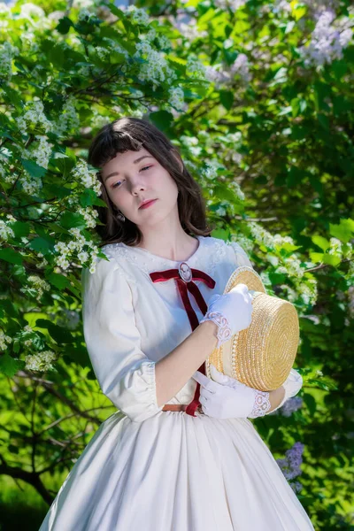 Portrait Girl White Dress Straw Hat Blooming Hawthorn Bush Park — Stock Photo, Image