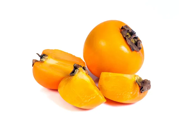 Persimmons on a table — Stock Photo, Image