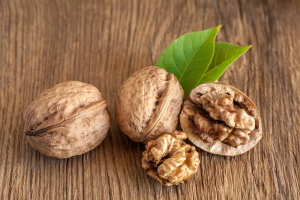 Walnuts with leaves — Stock Photo, Image