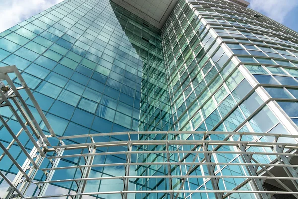 September 16, 2019. Kishinev, Republic of Moldova. Underside panoramic and perspective view to steel blue glass high rise building skyscrapers — Stock Photo, Image