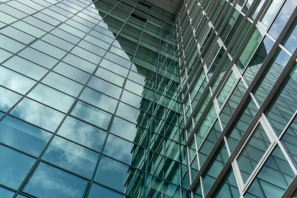 September 16, 2019. Kishinev, Republic of Moldova. Underside panoramic and perspective view to steel blue glass high rise building skyscrapers — Stock Photo, Image