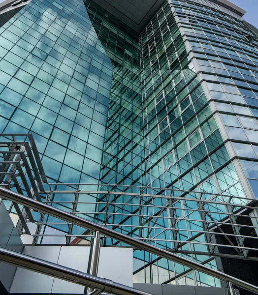 September 16, 2019. Kishinev, Republic of Moldova. Underside panoramic and perspective view to steel blue glass high rise building skyscrapers — Stock Photo, Image