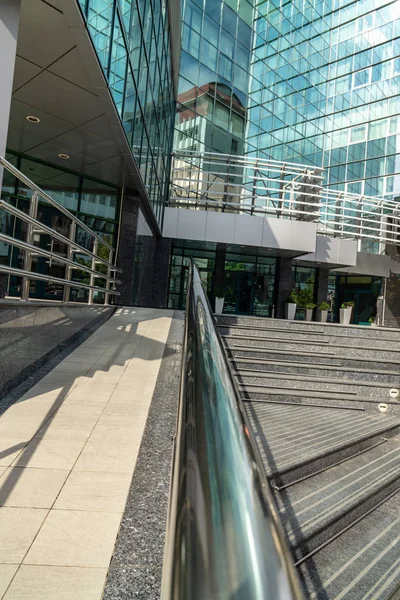 September 16, 2019. Kishinev, Republic of Moldova. Underside panoramic and perspective view to steel blue glass high rise building skyscrapers — Stock Photo, Image