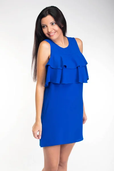 Menina em vestido azul elétrico brilhante — Fotografia de Stock