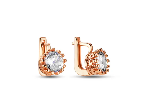 Boucles d'oreilles dorées avec cristaux sur fond blanc, or rose, gros diamant simple — Photo