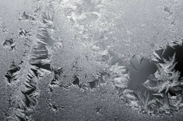 Modello di ghiaccio su vetro invernale — Foto Stock