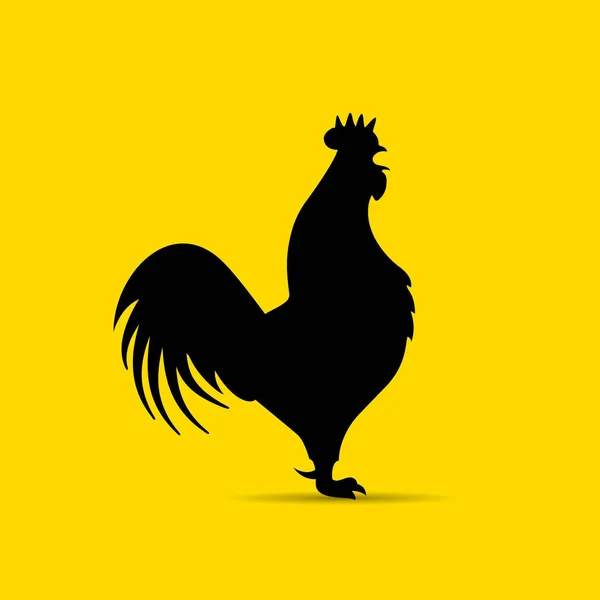 Rooster vector silhouette illustration isolated on yellow background Royalt...
