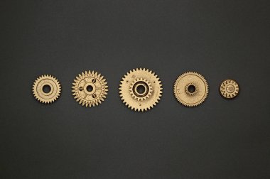 Endüstri projeleri veya mekanik konuları için altın plastik dişlilerin şablonu.