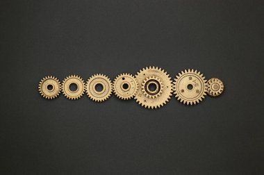 Endüstri projeleri veya mekanik konuları için altın plastik dişlilerin şablonu.