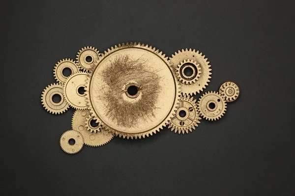 Template of golden plastic gears for industry projects or mechanics topics.