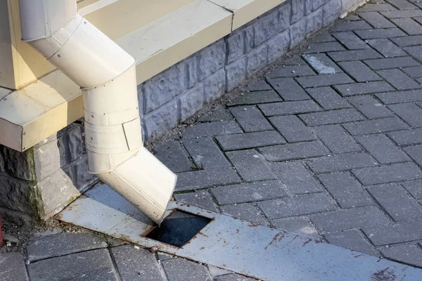Rainwater drainage system on the sidewalk closeup — Stock Image Rainwater drainage system on the sidewalk closeup Royalty Free Stock Photos