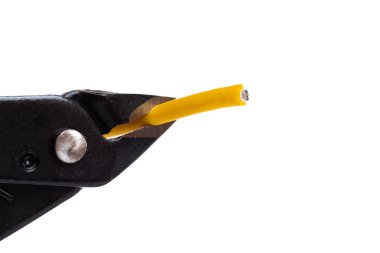 Blue wire cutter cuts yellow wire isolated on white background
