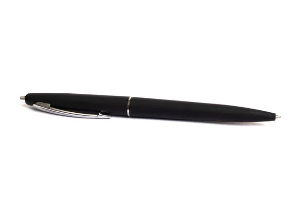 Черная шариковая ручка на белом фоне — стоковое фото