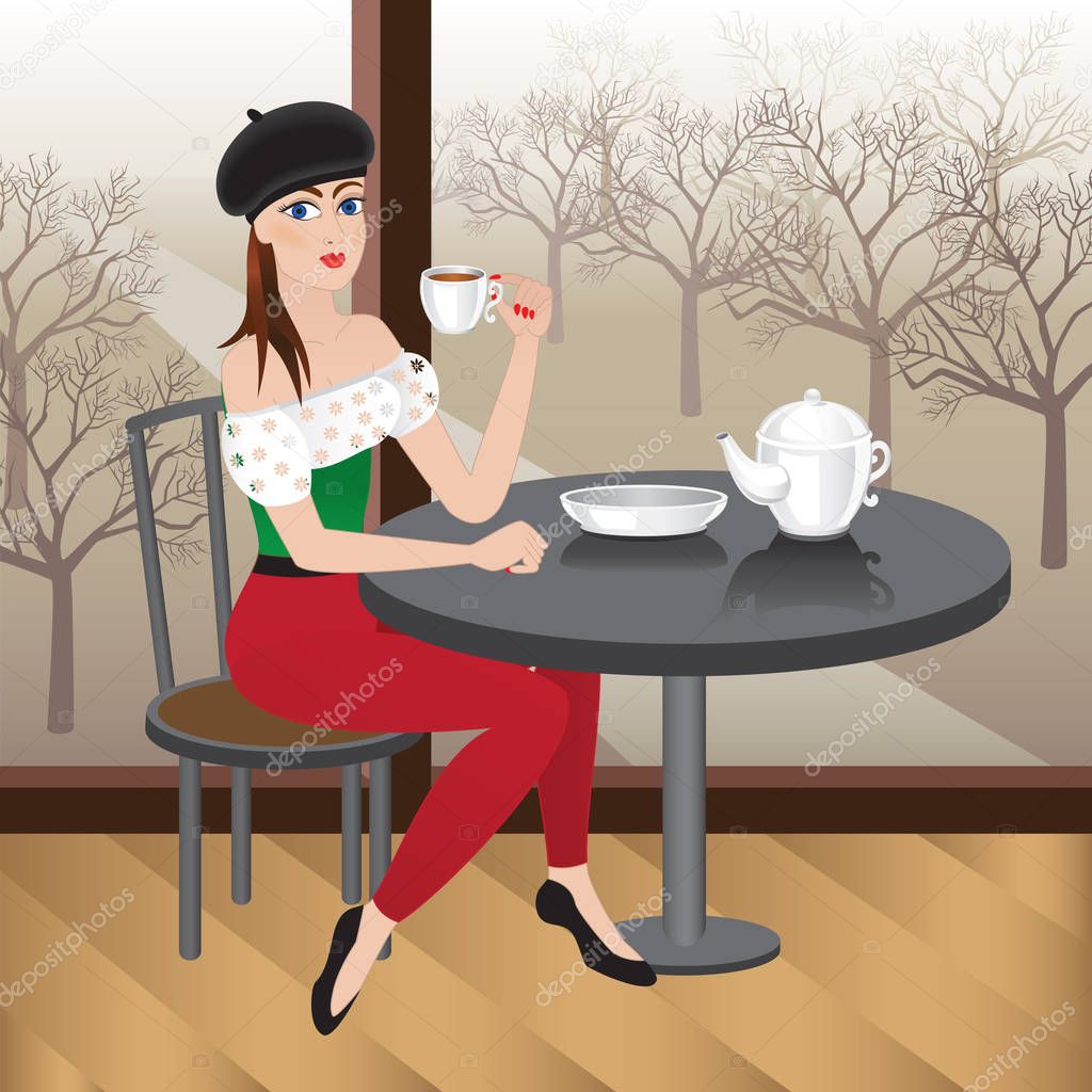 Beautiful woman sitting in cafe with cup of tea