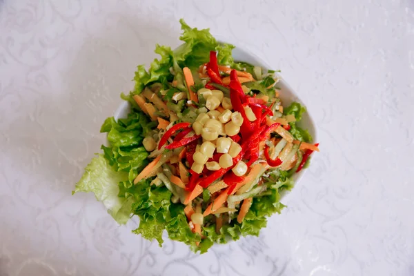 Lettuce with markof, pepper, corn . Salad with markof pepper corn