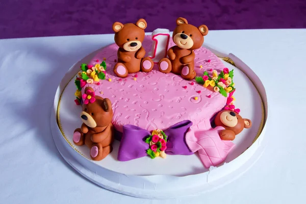 Pink bear bears cake. 1 year old birthday. Cake . Big beautiful kids cake decorated with turquoise Teddy bear — Stock Photo, Image