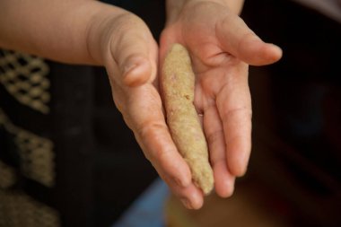Right frame - hands sculpt cutlets. Woman hand making meatballs for homemade fried minced meat cutlets . Hands with meatballs cutlets close-up.