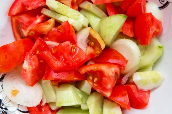 Tomato cucumber salad inside the trough Azerbaijani salad — Stock Photo, Image