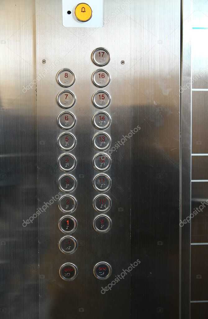 The elevator buttons in the business building . Elevator . One floor on elevator buttons . Buttons with floors numbers in an elevator. lift