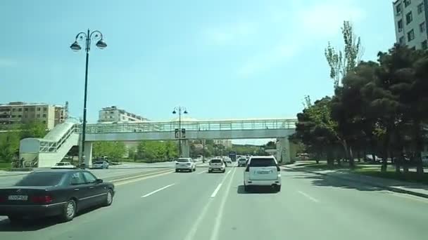 The road to the airport . Asphalt road . View of the road from the bus . Road traffic on the way to Baku . Azerbaijan Baku . 06.05.2019 . — Stock Footage Road Airport Asphalt Road View Road Bus Road Traffic Way Royalty Free Stock Video