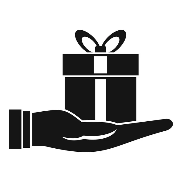 Caja de regalo en icono de la mano, estilo simple — Archivo Imágenes Vectoriales
