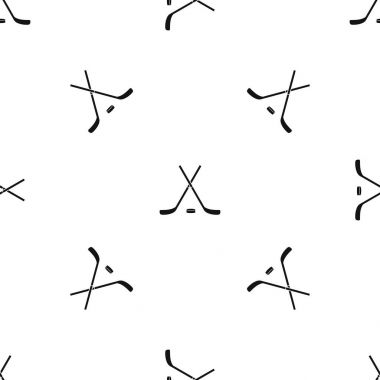 Çapraz hokey sopaları ve puck sorunsuz siyah desen