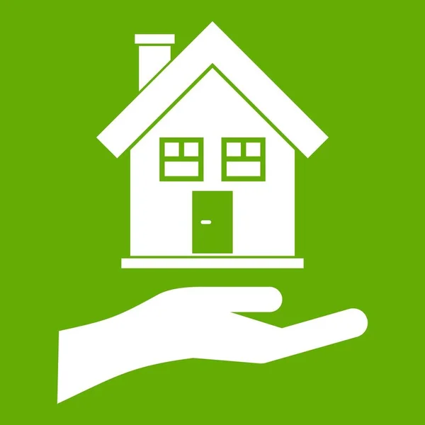 Hand hält Haus Ikone grün — Stockvektor