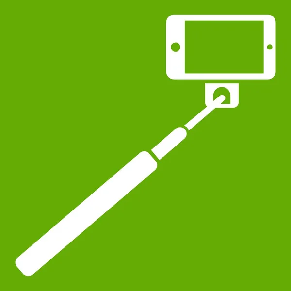 Selfie stick e icona smartphone verde — Vettoriale Stock