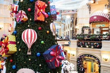 MOSCOW, RUSSIA - DECEMBER 3, 2017: New Years and Christmas decoration of the GUM in Moscow, Russia. clipart