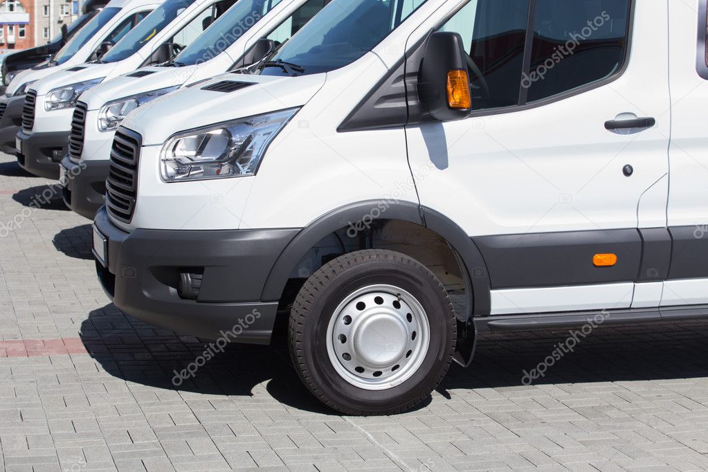 minibuses and vans outside