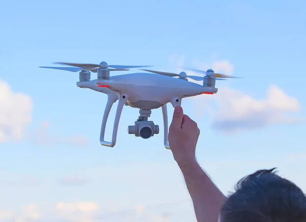 Quadricopter  in male hand — Stock Photo, Image