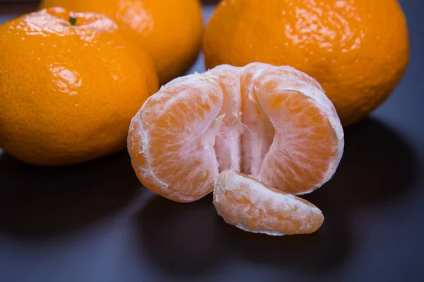 Tangerines on black background — Stock Photo, Image