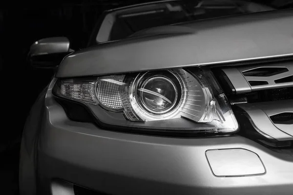 Headlight of prestigious car closeup — Stock Photo, Image