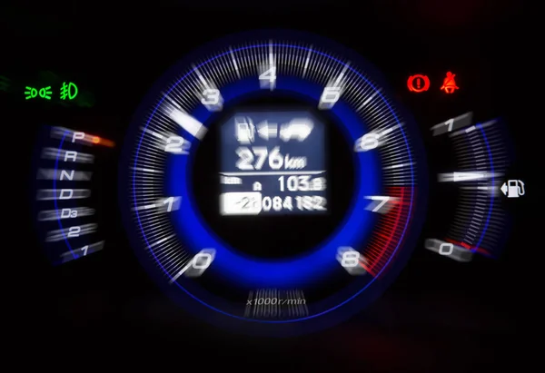 Automotive tachometer on black background, motion blur filter ef — Stock Photo, Image