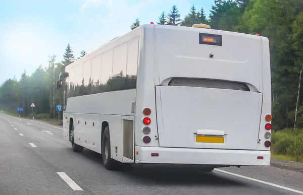 Tourist bus goes on highway — Stock Photo, Image
