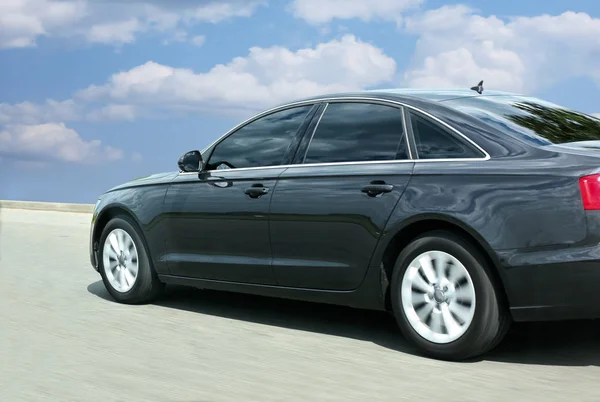 Black  car moves — Stock Photo, Image