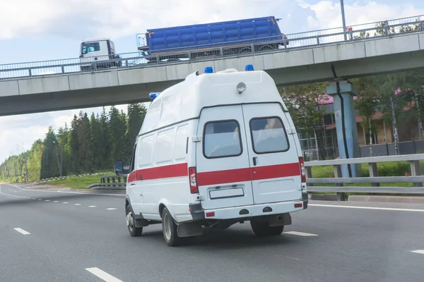 Car ambulance on the highway — Stock Photo, Image