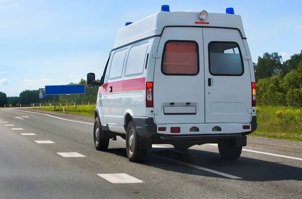 Car ambulance on the highway — Stock Photo, Image