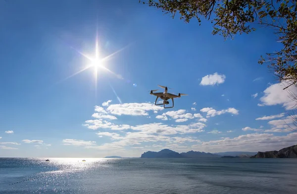 Drone in the sunny sky — Stock Photo, Image