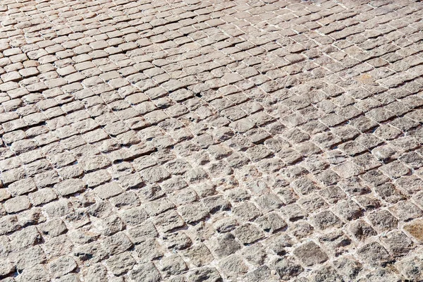 Old rough stone pavement — Stock Photo, Image