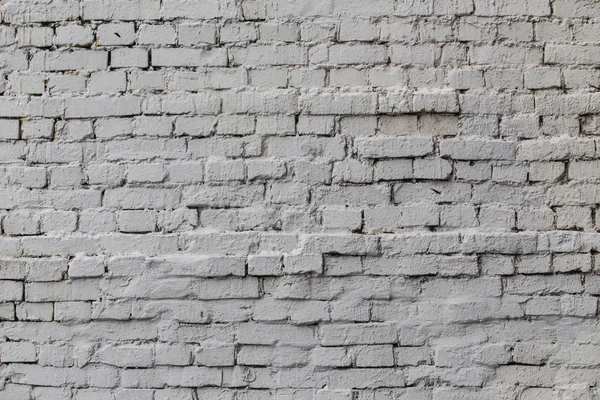 Achtergrond bakstenen muur geschilderd met witte verf — Stockfoto