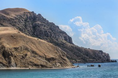 mountain by the sea on a summer day