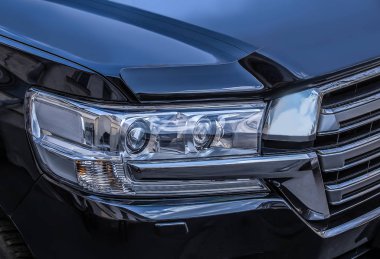 headlight of prestigious car close up