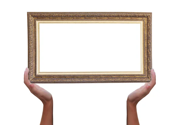 Moldura de um quadro em mãos femininas isoladas em um branco — Fotografia de Stock